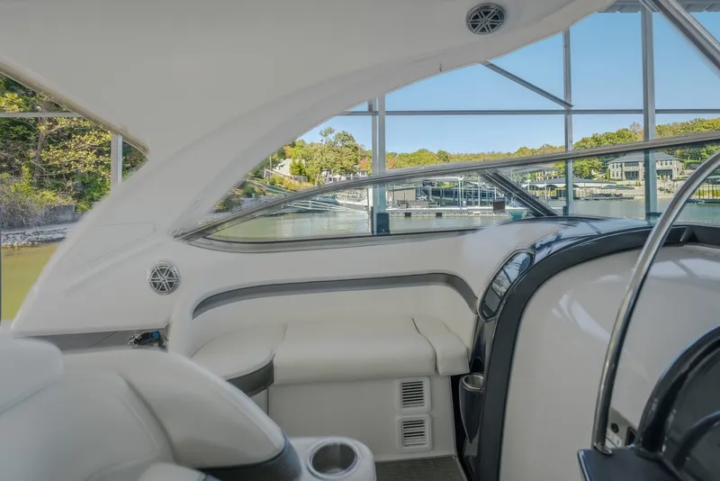 Slide: The Image of Interior view of a 2017 Formula 37 Performance Cruiser, showcasing sleek design and waterfront scenery. - 33
