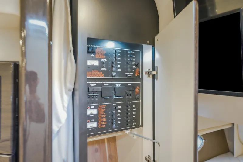 Slide: The Image of Electrical control panel inside 2017 Formula 37 Performance Cruiser yacht cabin. - 63
