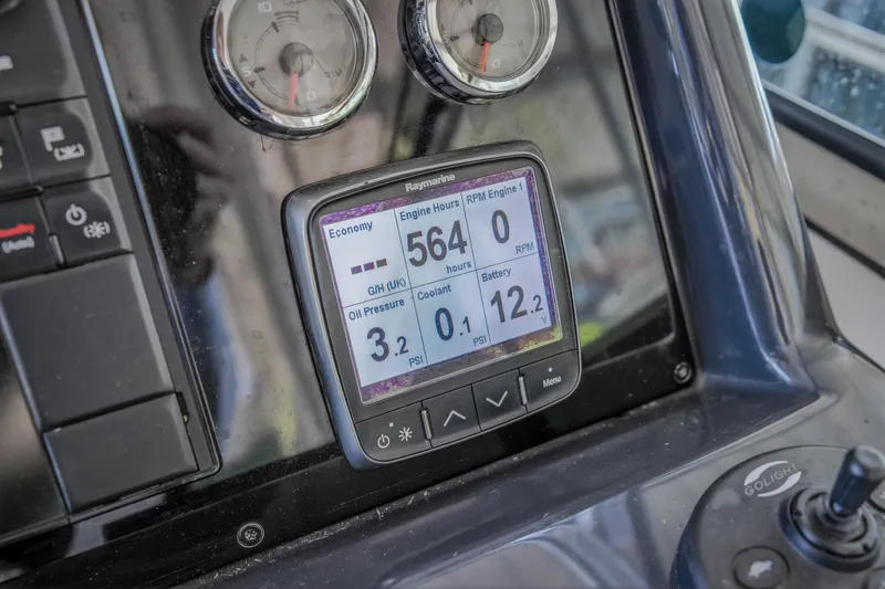 Slide: The Image of Control panel of a 2017 Formula 37 Performance Cruiser displaying engine metrics. - 31