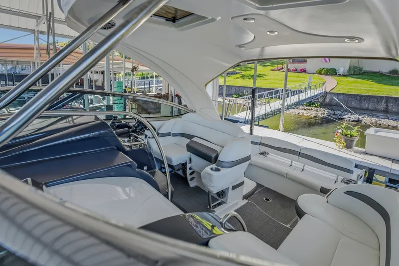 Slide: The Image of Luxurious interior of a 2017 Formula 37 Performance Cruiser docked by a scenic waterfront. - 41