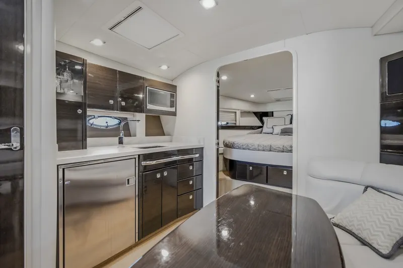 Slide: The Image of Luxurious interior of 2017 Formula 37 Performance Cruiser with modern kitchen and cozy bedroom. - 52