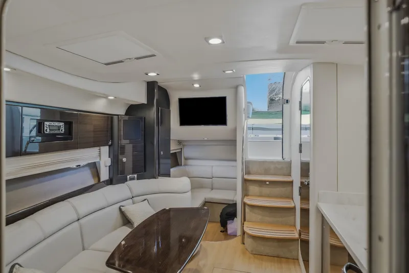 Slide: The Image of Luxurious interior of a 2017 Formula 37 Performance Cruiser with modern seating and entertainment area. - 62