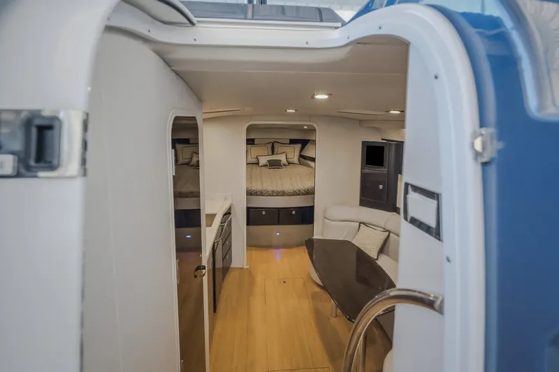 Slide: The Image of Interior of 2017 Formula 37 Performance Cruiser, featuring cozy seating and elegant wood flooring. - 48