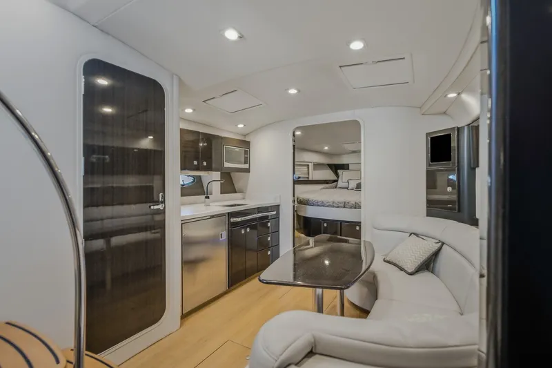 Slide: The Image of Luxurious interior of 2017 Formula 37 Performance Cruiser with modern kitchen and cozy seating area. - 58