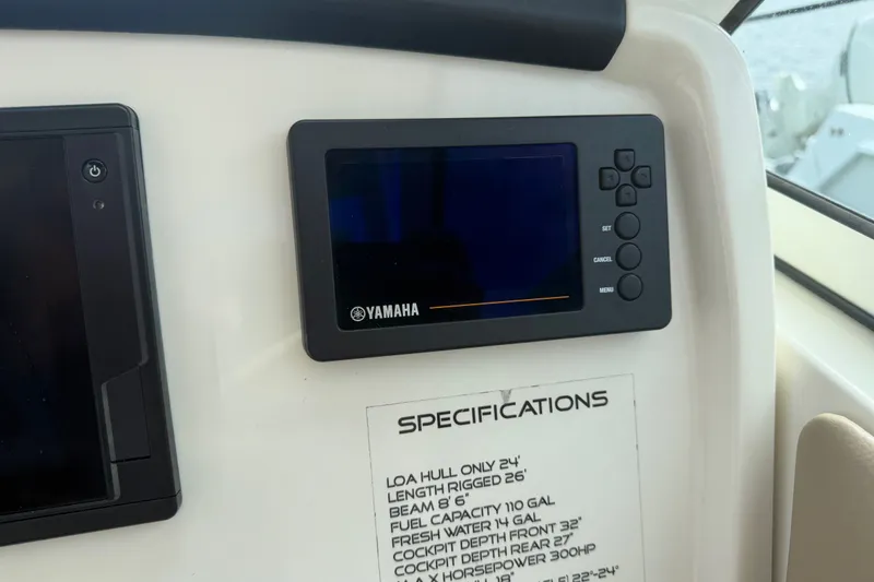 Slide: The Image of Yamaha display and specifications on 2019 Sailfish 245 DC boat dashboard. - 19
