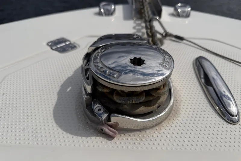 Slide: The Image of Close-up of a 2019 Sailfish 245 DC boat's anchor windlass on deck. - 11