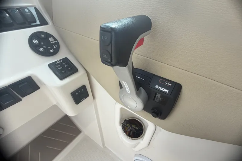 Slide: The Image of Control panel of a 2019 Sailfish 245 DC boat with Yamaha throttle. - 21