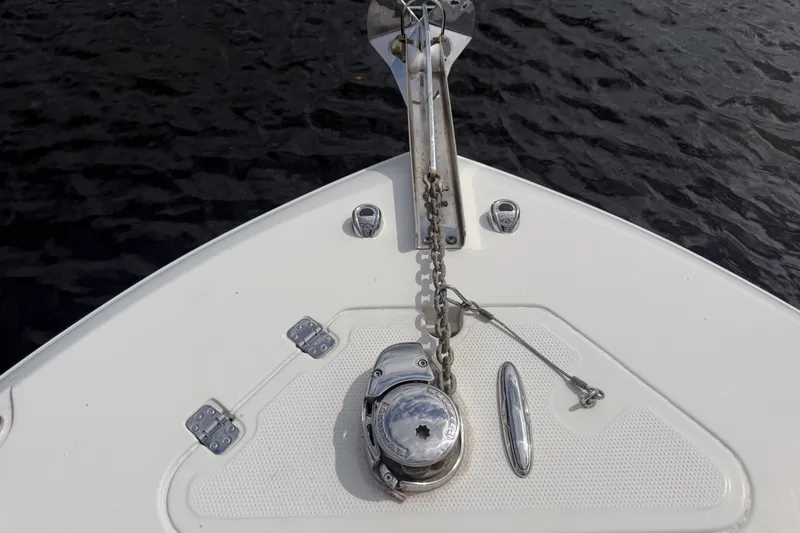 Slide: The Image of Bow of 2019 Sailfish 245 DC boat with anchor chain and winch. - 10