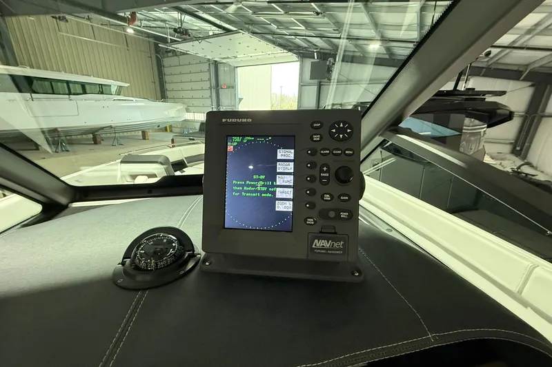Slide: The Image of Cockpit of 2025 Monterey Elite 27 OB with Furuno navigation system. - 25
