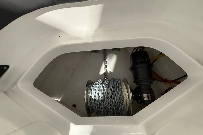 Slide: The Image of Anchor chain compartment of 2025 Monterey Elite 27 OB boat. - 34