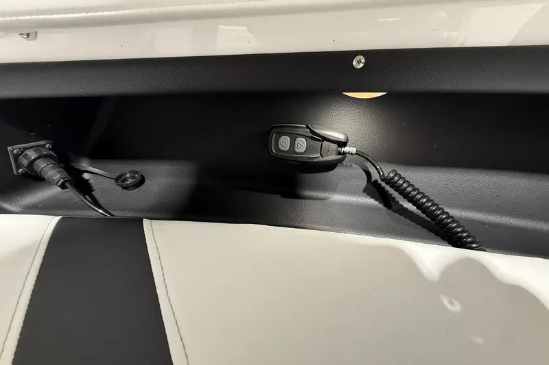 Slide: The Image of Control panel and wiring in 2025 Monterey Elite 27 OB boat interior. - 35