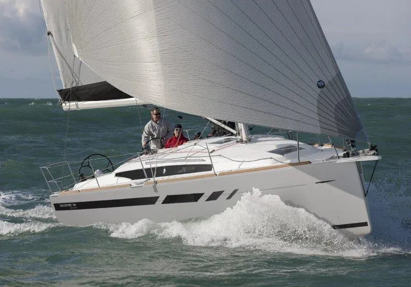 Slide: The Image of 2024 Jeanneau Sun Odyssey 349 sailing on the ocean. - 10