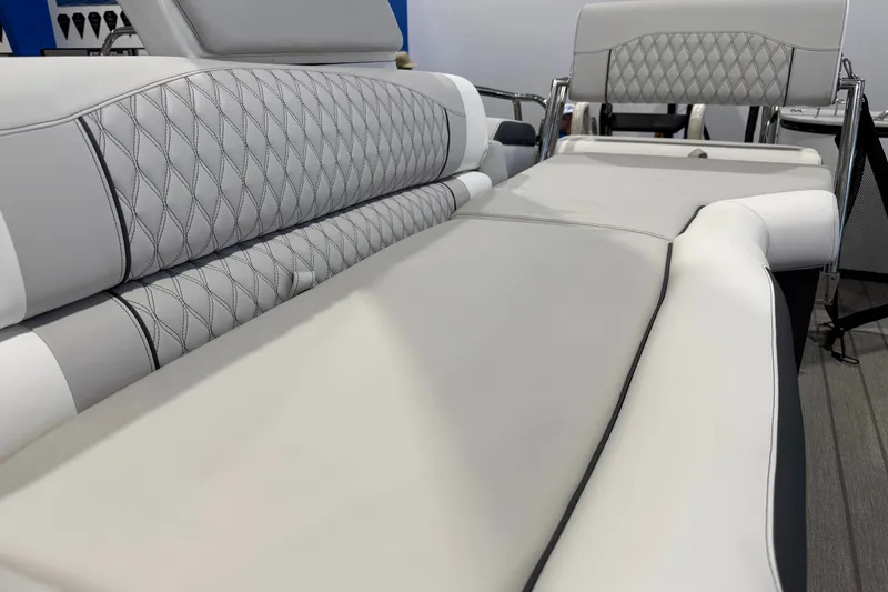 Slide: The Image of Luxurious seating on 2027 Avalon 2585 EXCALIBUR QLWS boat with diamond-stitched upholstery. - 13