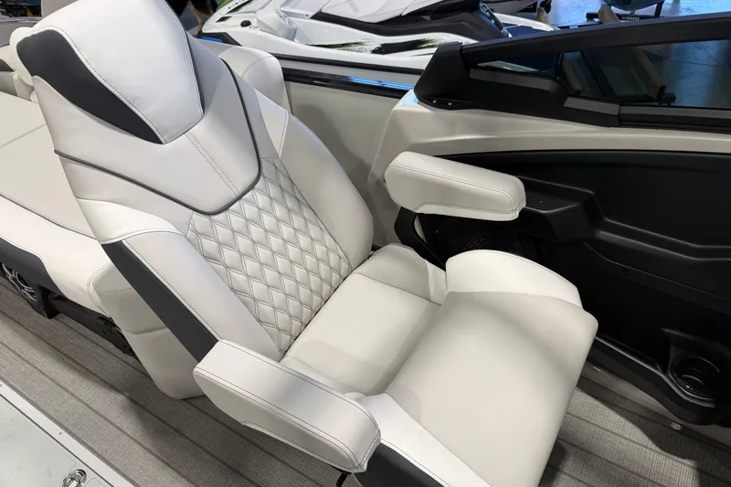 Slide: The Image of Luxurious seating in 2027 Avalon 2585 EXCALIBUR QLWS boat, featuring diamond-stitched upholstery. - 8