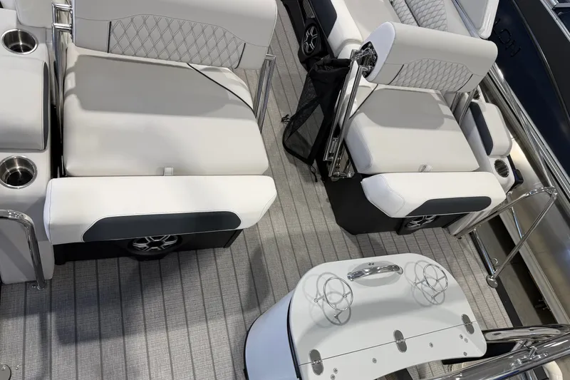 Slide: The Image of Luxurious seating on 2027 Avalon 2585 EXCALIBUR QLWS boat with modern design and cup holders. - 16