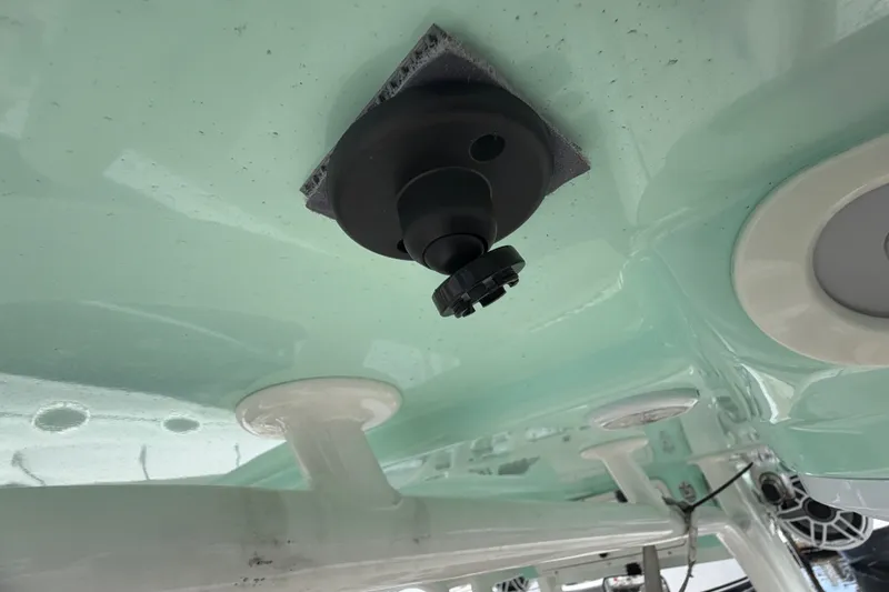 Slide: The Image of 2022 NauticStar 28 XS boat underside with mounted equipment. - 48