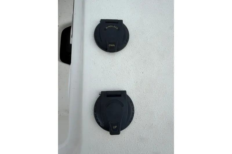 Slide: The Image of Windlass controls on 2022 NauticStar 28 XS boat deck. - 24