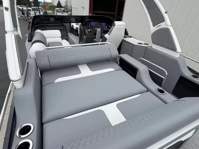 Slide: The Image of The image shows the luxurious interior of a 2027 Tahoe Grand 25 Flex Lounge Windshield with gray upholstery. - 24