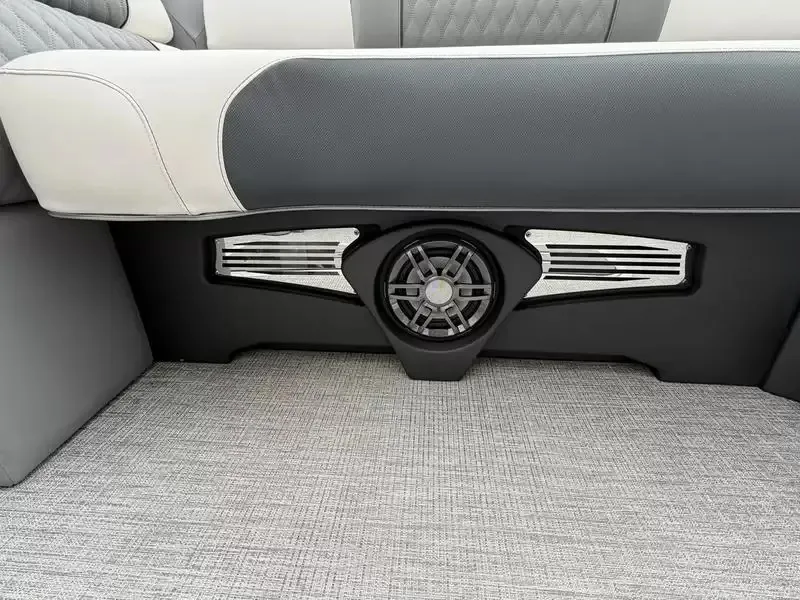 Slide: The Image of Close-up of a speaker in a modern boat with gray carpet flooring. - 10