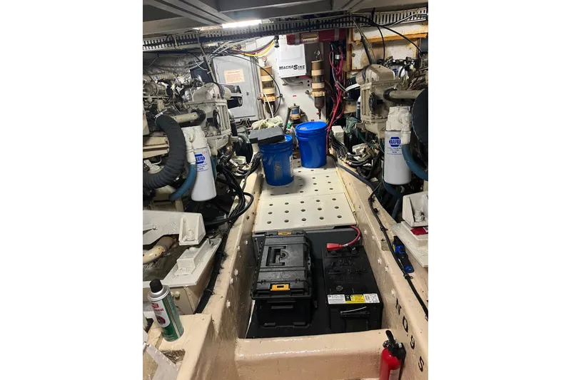 Slide: The Image of Engine room of a 1989 Californian 45 Motor Yacht with visible machinery and equipment. - 40