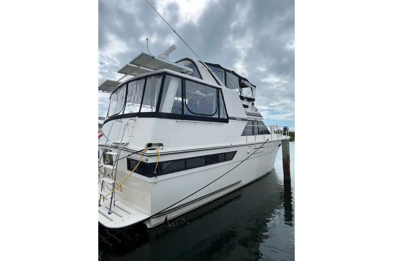 The Image of 1989 Californian 45 Motor Yacht docked under cloudy skies. - 0