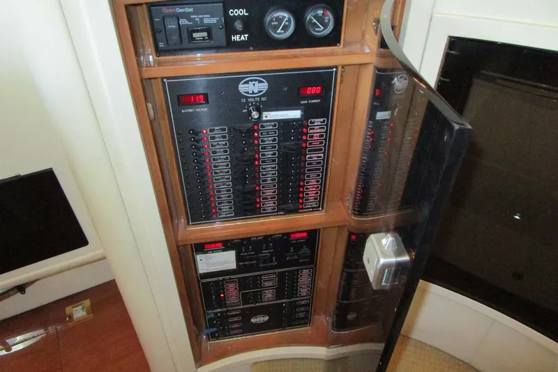 Slide: The Image of Electrical panel of 2006 Neptunus 56 Flybridge yacht with gauges and controls. - 17