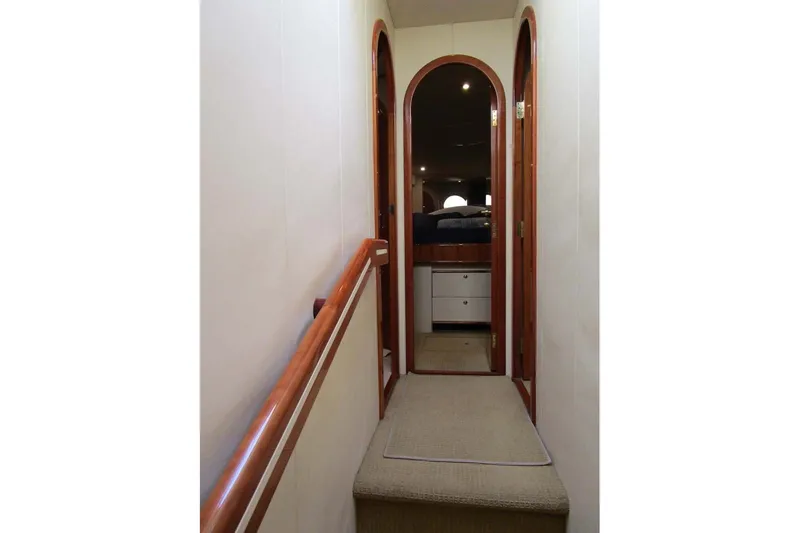 Slide: The Image of Interior hallway of 2006 Neptunus 56 Flybridge yacht with wooden accents. - 26