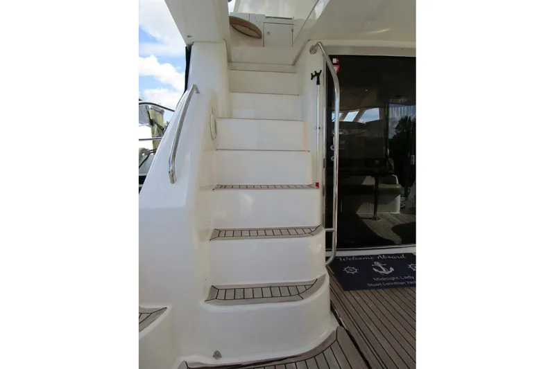 Slide: The Image of Staircase on 2006 Neptunus 56 Flybridge yacht, leading to upper deck. - 50