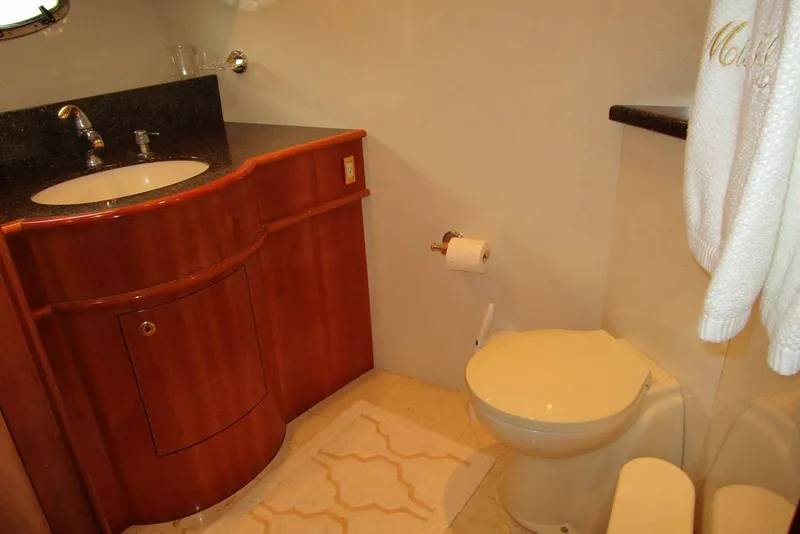 Slide: The Image of Luxurious bathroom in 2006 Neptunus 56 Flybridge yacht with wooden cabinetry. - 24