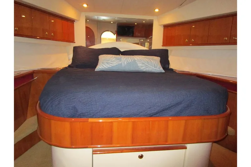 Slide: The Image of Luxurious cabin interior of 2006 Neptunus 56 Flybridge yacht with cozy bedding. - 31