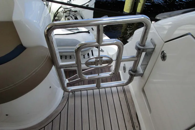 Slide: The Image of Stainless steel gate on 2006 Neptunus 56 Flybridge yacht with teak decking. - 49