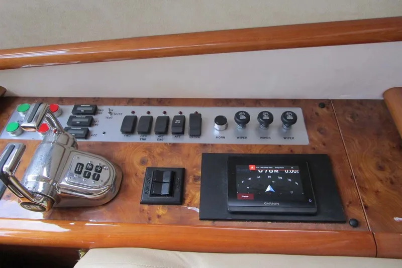 Slide: The Image of Control panel of a 2006 Neptunus 56 Flybridge yacht with navigation system. - 16