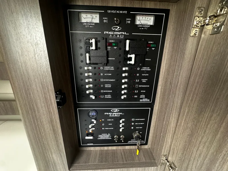 Slide: The Image of Electrical control panel in the 2021 Regal 36 Grande Coupe. - 15