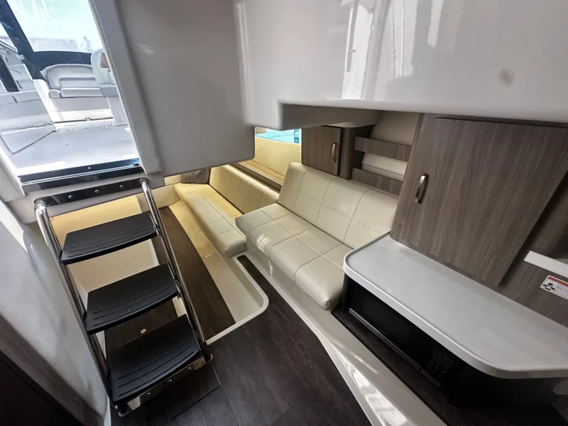 Slide: The Image of Interior of the 2021 Regal 36 Grande Coupe with modern seating and sleek design. - 4