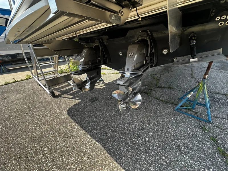 Slide: The Image of The image shows the drives of a 2021 Regal 36 Grande Coupe on a parking lot. - 2