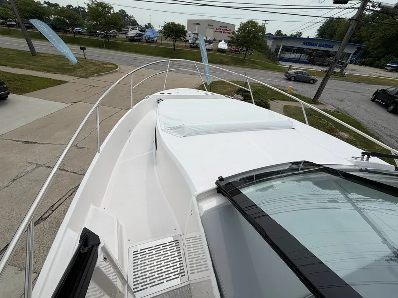 Slide: The Image of The deck of a 2027 Regal 36 Grande Coupe with sleek lines and modern design. - 19