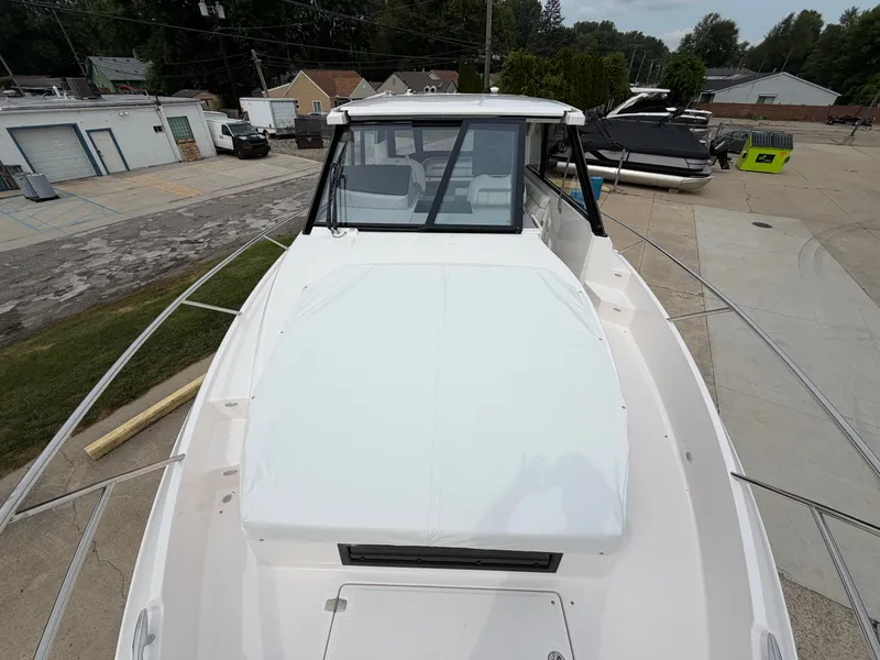 Slide: The Image of The boat features a modern design with a spacious foredeck and large windows. - 20