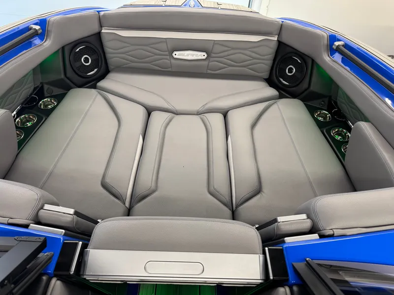 Slide: The Image of The image shows the luxurious interior of a Supra SA 450 boat with gray upholstery and speakers. - 19