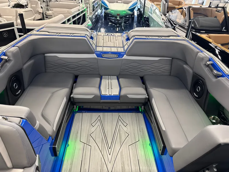 Slide: The Image of Interior of a modern boat with gray upholstery and blue accents. - 27
