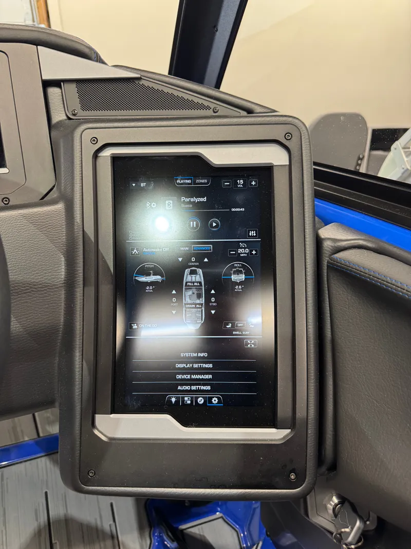 Slide: The Image of The image shows a modern control tablet in a Supra SA 450 boat. - 31