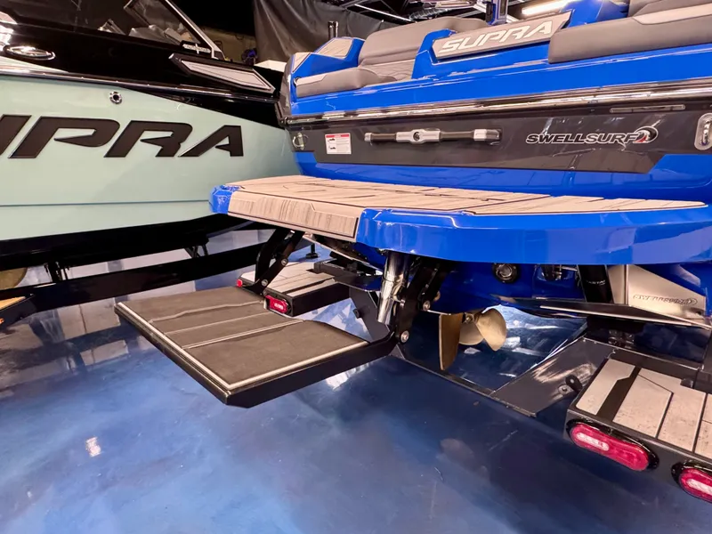 Slide: The Image of Rear view of a Supra SA 450 with a fold-out swim platform. - 6