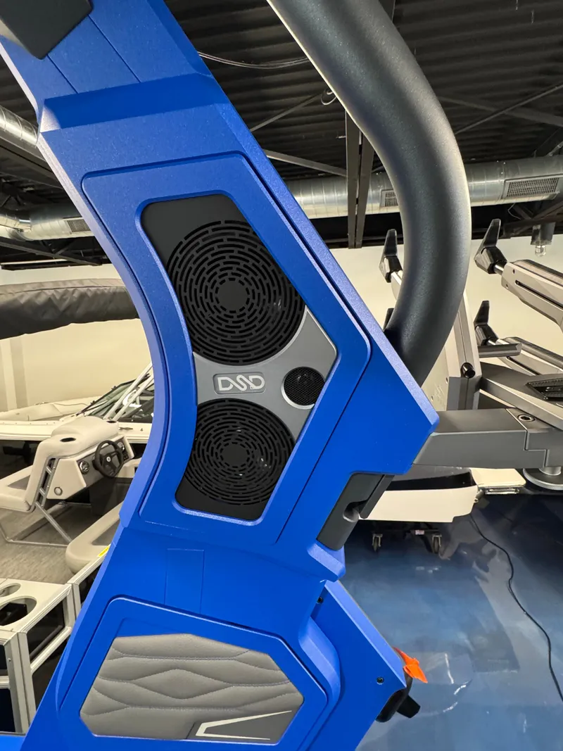 Slide: The Image of Close-up of a blue boat tower with speakers and padding. - 14