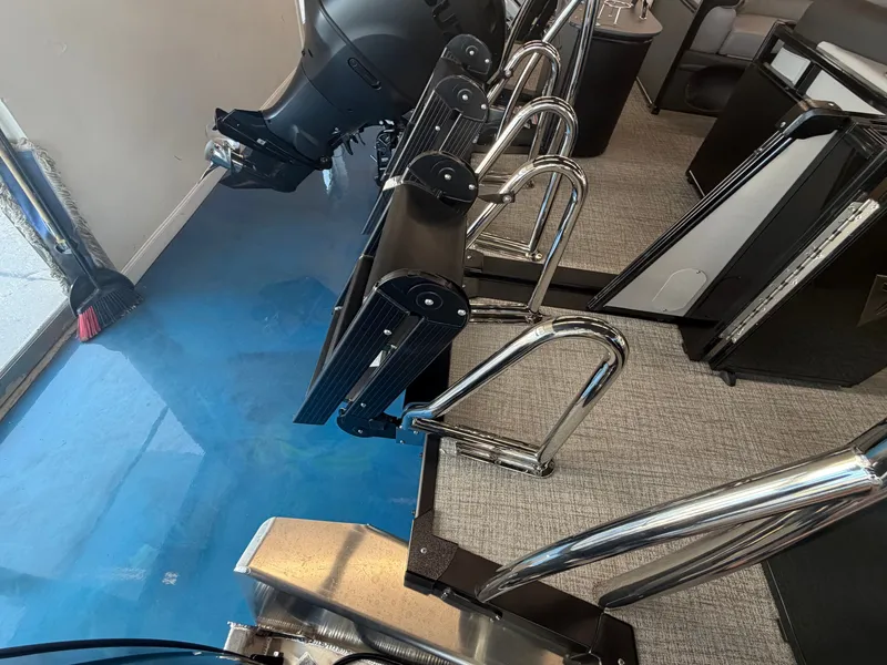 Slide: The Image of The image shows the interior of a boat with an engine and several metal railings. - 15