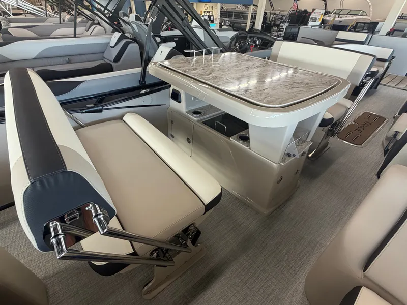 Slide: The Image of Interior of a modern pontoon boat with stylish seating and a sleek table. - 10