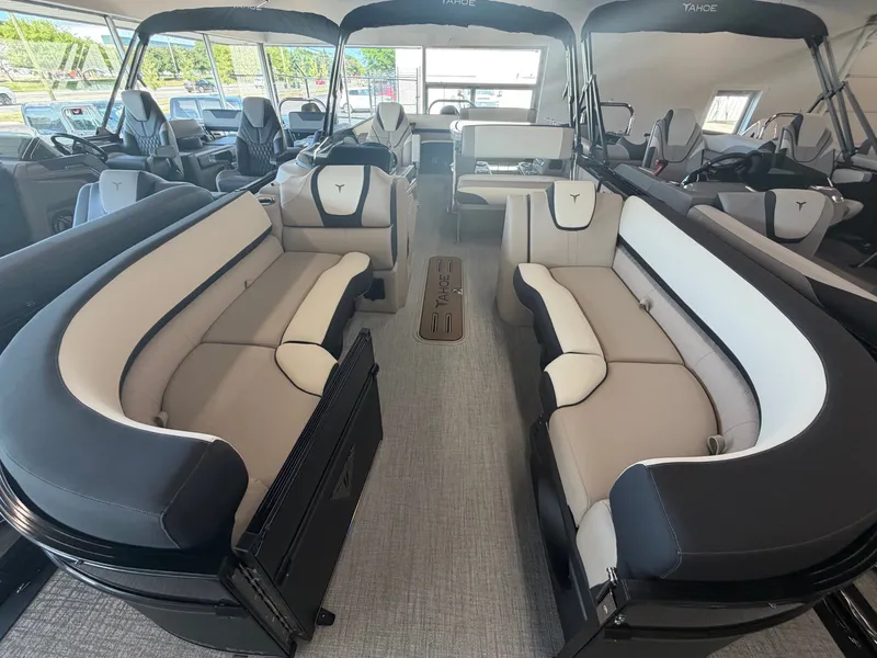 Slide: The Image of Interior view of a luxury pontoon boat with sleek seating and modern design. - 2