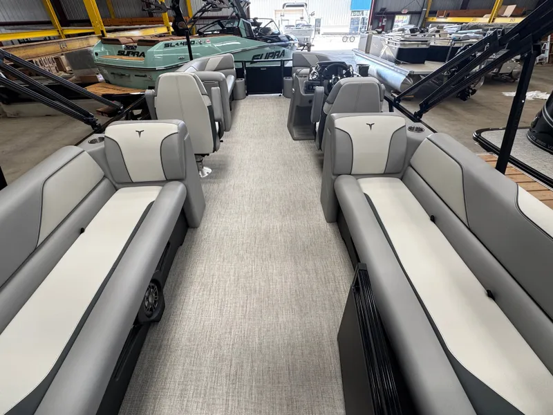 Slide: The Image of Interior of a modern boat with gray and white seating. - 6