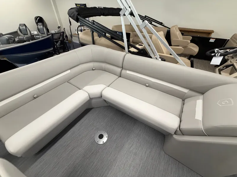Slide: The Image of Interior view of a 2027 Godfrey EX 1880 Cruise with gray upholstered seating. - 8