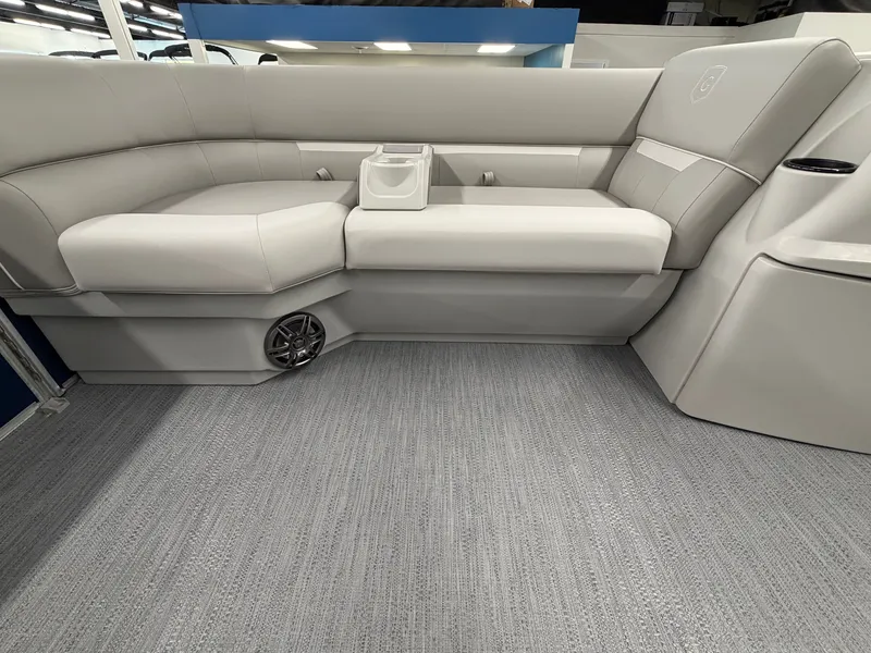 Slide: The Image of Interior of a 2027 Godfrey EX 1880 Cruise with gray upholstery and carpeted flooring. - 5
