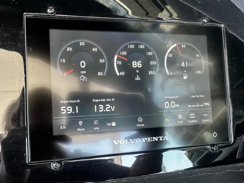 Slide: The Image of The image shows a Volvo Penta dashboard with digital displays for engine data. - 23