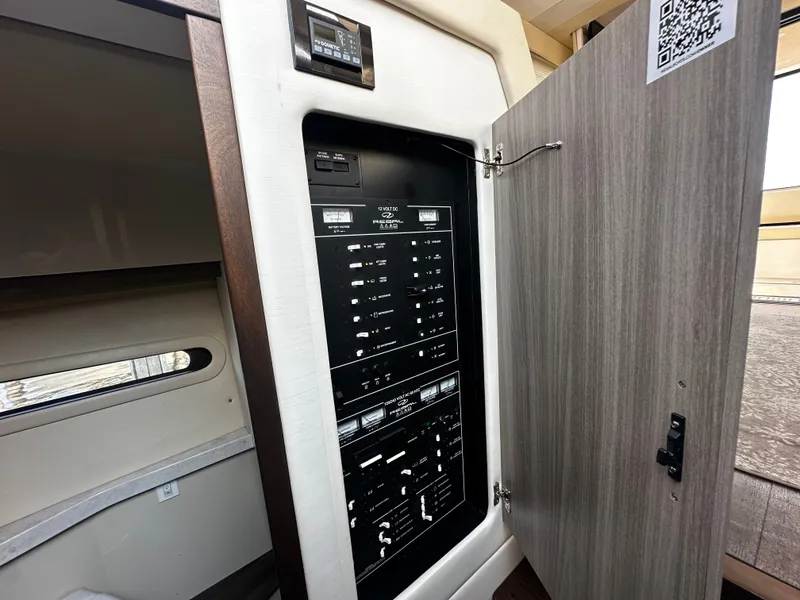 Slide: The Image of Electrical control panel in a 2022 Regal 38 Grande Coupe. - 21